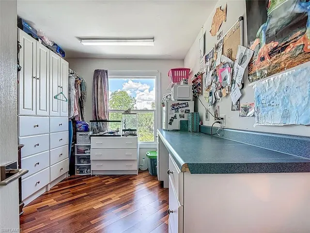 a kitchen with stainless steel appliances a stove and a refrigerator