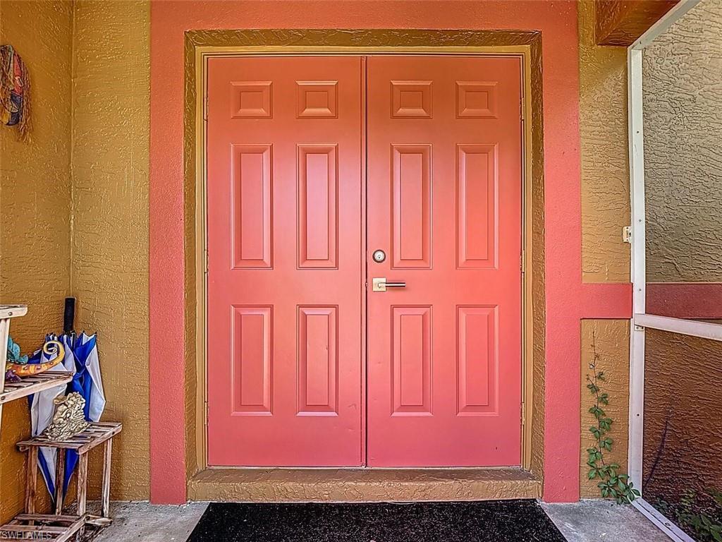 14991 Savannah Drive Naples, FL 34119 - Photo 6 of 50 a view of front door