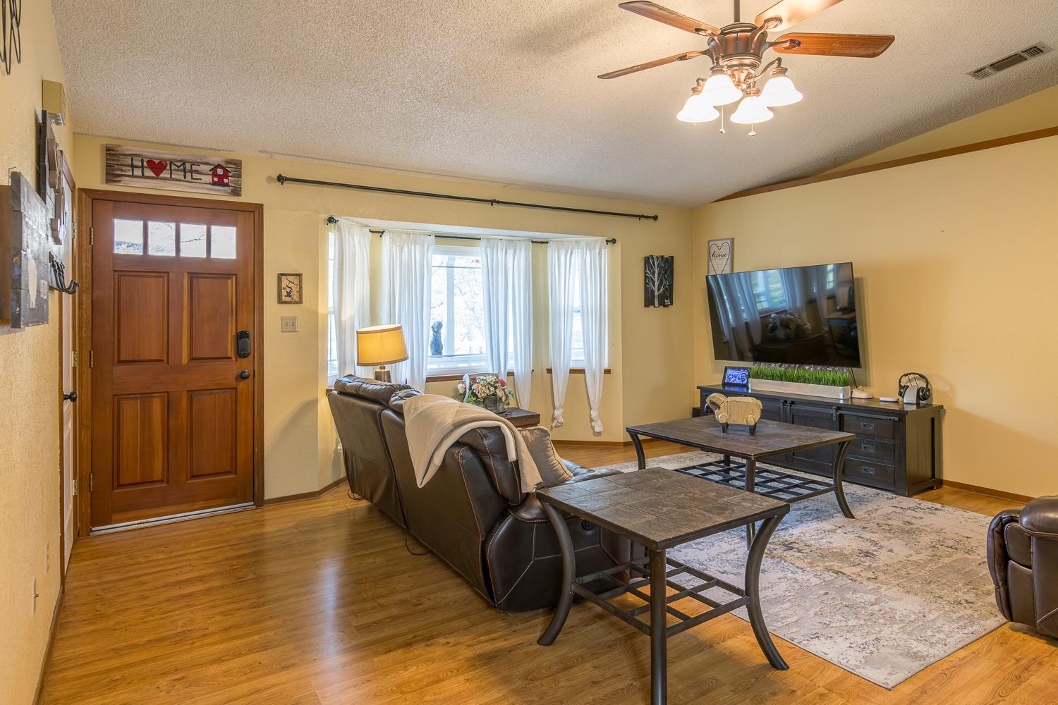 2155 El Faro Way La Grange, CA 95329 - Photo 14 of 52 a view of a livingroom with furniture window and wooden floor