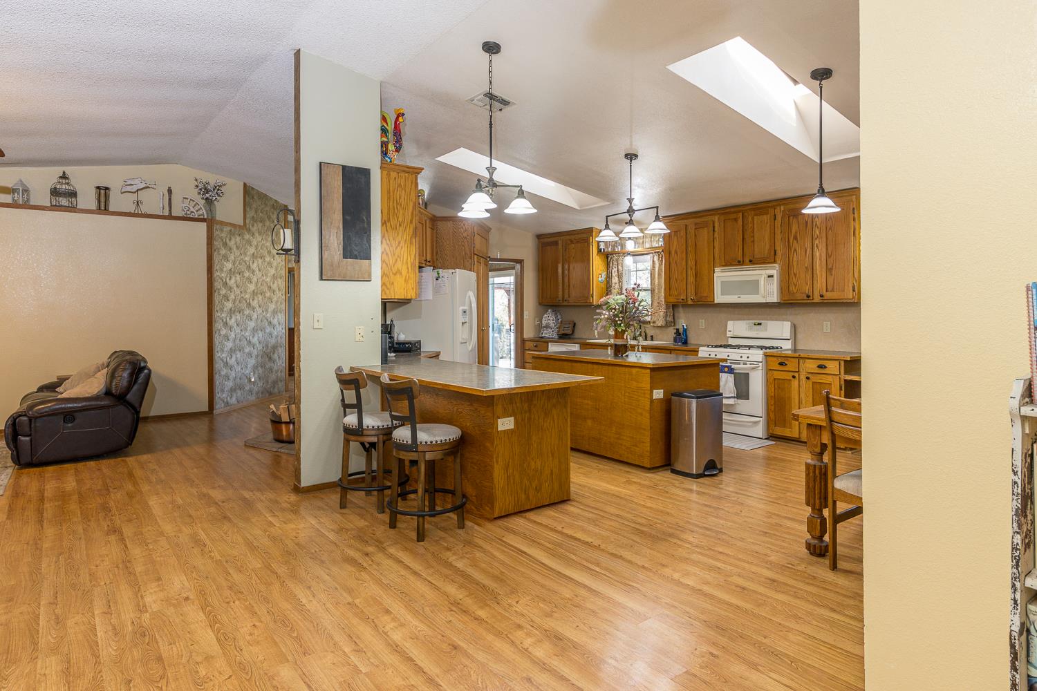 2155 El Faro Way La Grange, CA 95329 - Photo 17 of 52 a kitchen with a sink appliances and cabinets