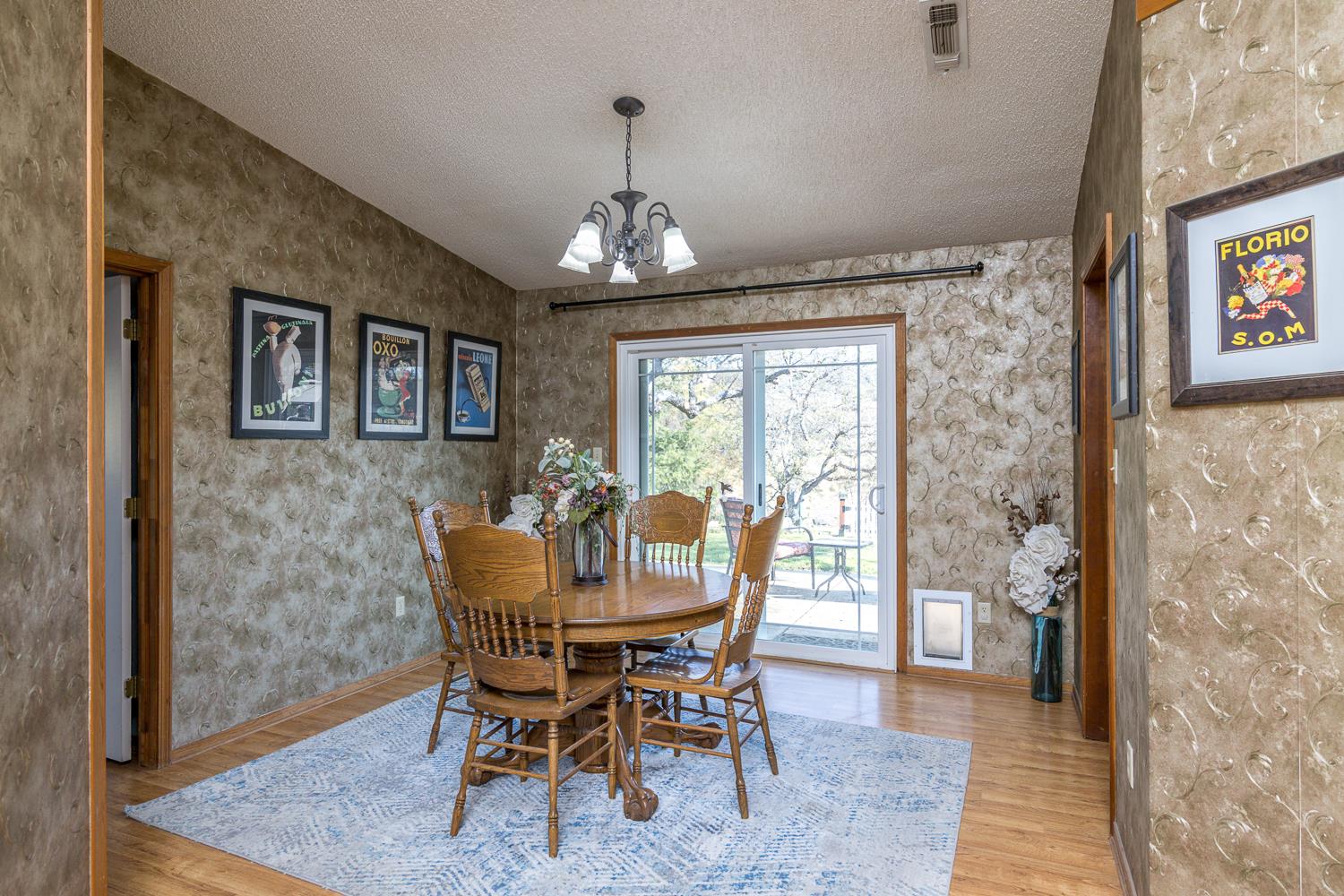 2155 El Faro Way La Grange, CA 95329 - Photo 19 of 52 a view of a dining room with furniture and wooden floor