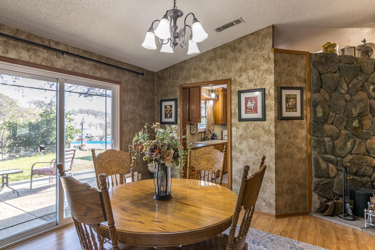 2155 El Faro Way La Grange, CA 95329 - Photo 20 of 52 a view of a dining room with furniture window and outside view