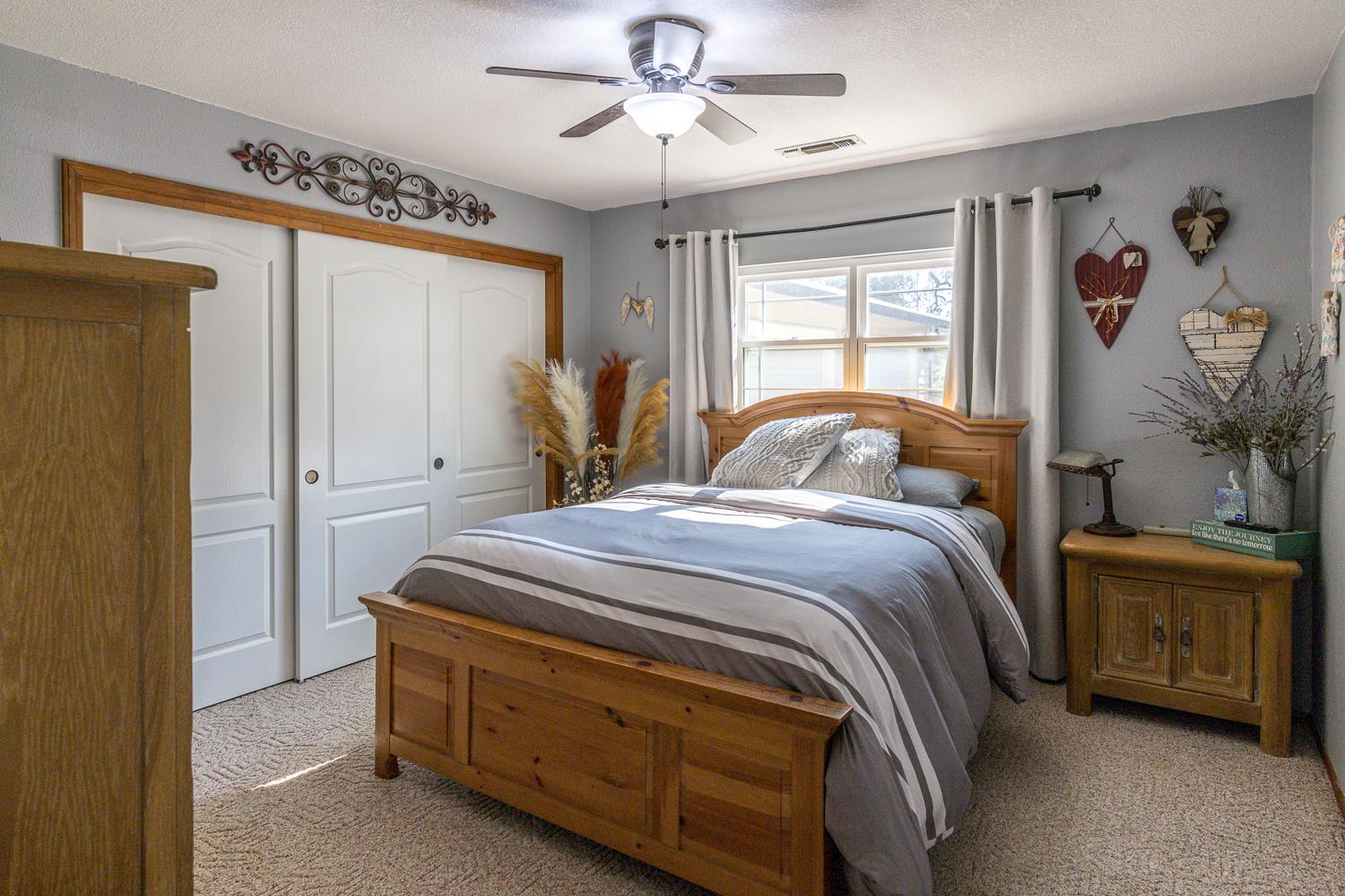 2155 El Faro Way La Grange, CA 95329 - Photo 25 of 52 a bedroom with a bed and a window