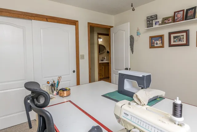 a view of a livingroom with a bookshelf