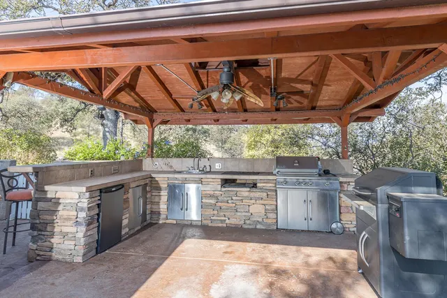 a view of a swimming pool with a yard