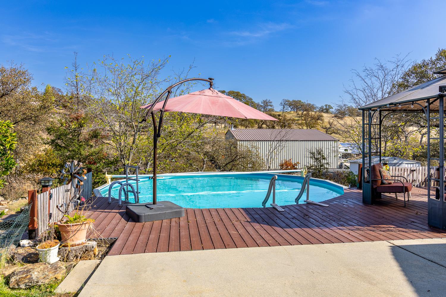 2155 El Faro Way La Grange, CA 95329 - Photo 40 of 52 a view of sitting area with furniture and umbrella
