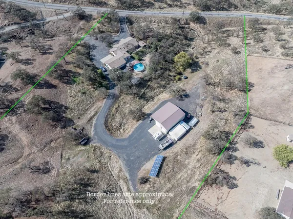 an aerial view of house with outdoor space