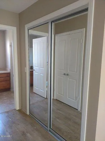 an empty room and closet area