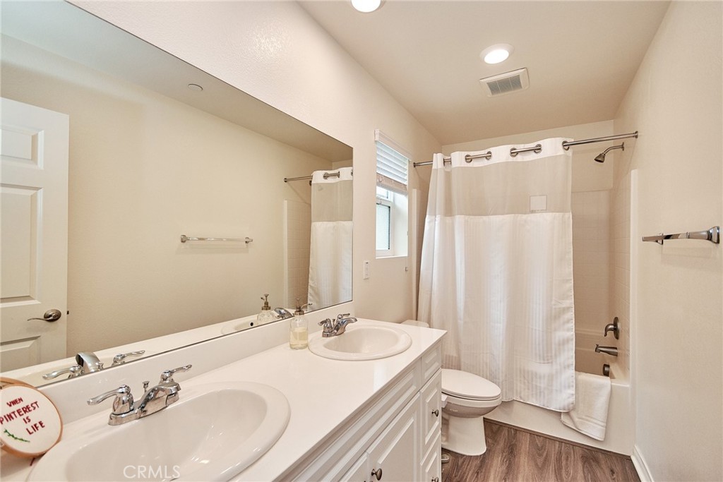 2375 Vineyard Street Upland, CA 91786 - Photo 7 of 33 a bathroom with a sink toilet and shower
