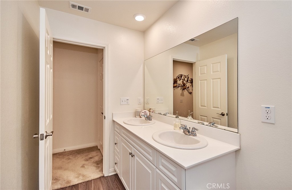2375 Vineyard Street Upland, CA 91786 - Photo 8 of 33 a bathroom with a sink and a mirror