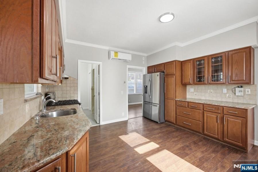 693 North 8th Street Newark, NJ 07107 - Photo 2 of 23 a kitchen with stainless steel appliances granite countertop a refrigerator and a sink