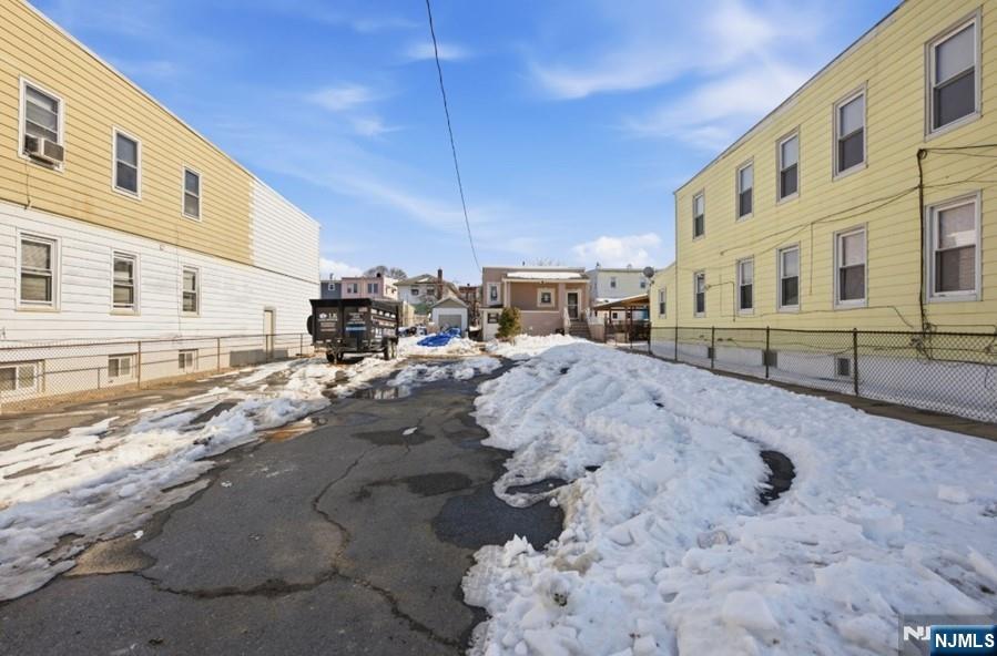 693 North 8th Street Newark, NJ 07107 - Photo 23 of 23 a view of a street with big house
