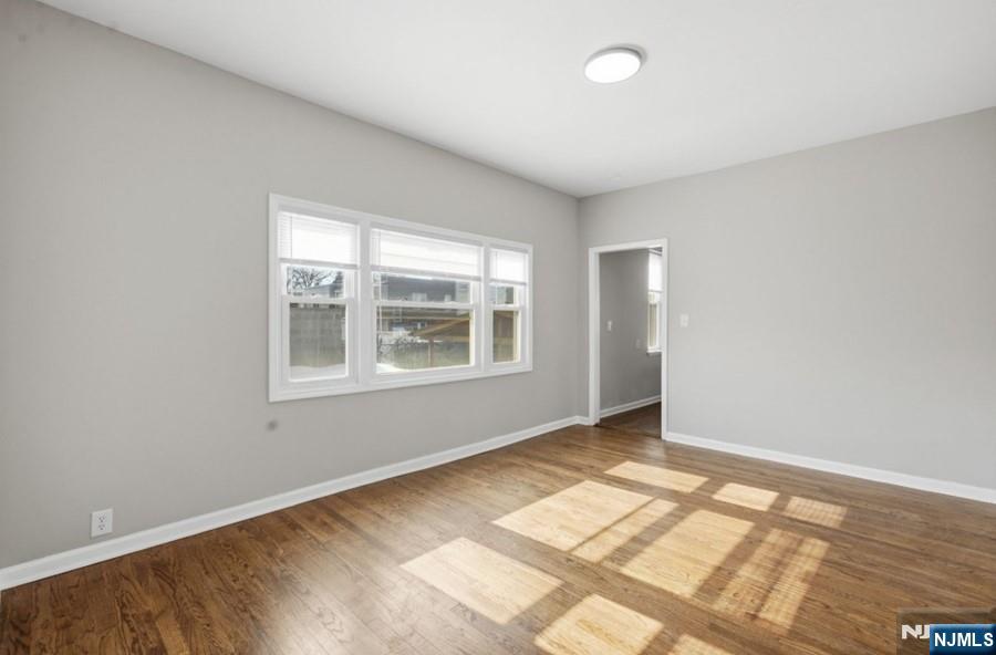 693 North 8th Street Newark, NJ 07107 - Photo 9 of 23 an empty room with windows