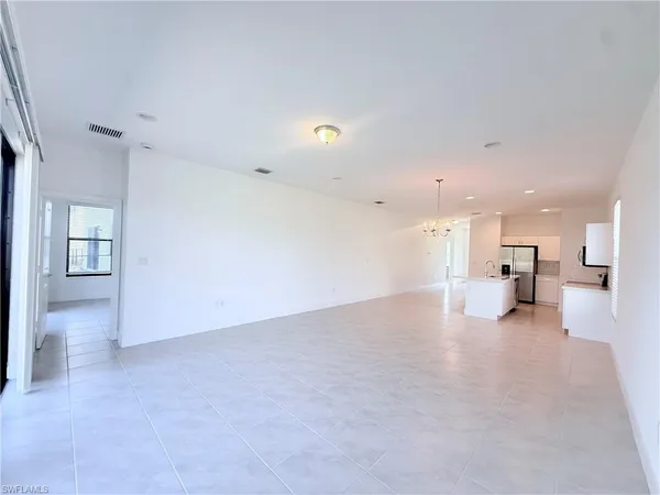 an empty room with a natural light