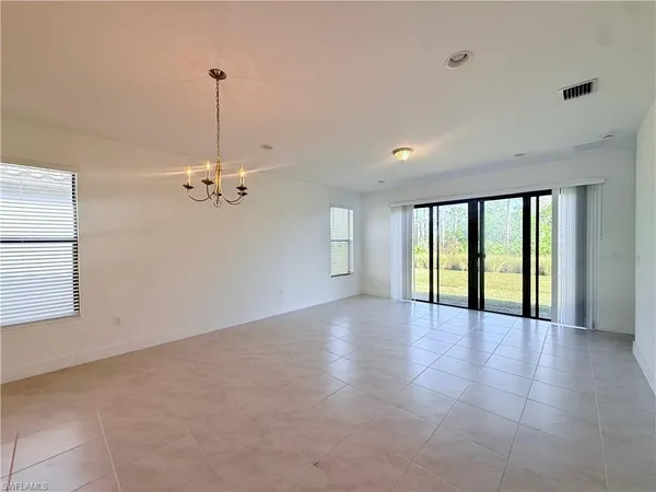 a view of a big room with wooden floor