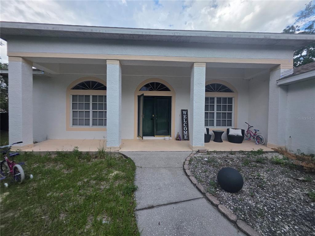 17820 Monteverde Drive Spring Hill, FL 34610 - Photo 5 of 42 a view of a front door of house