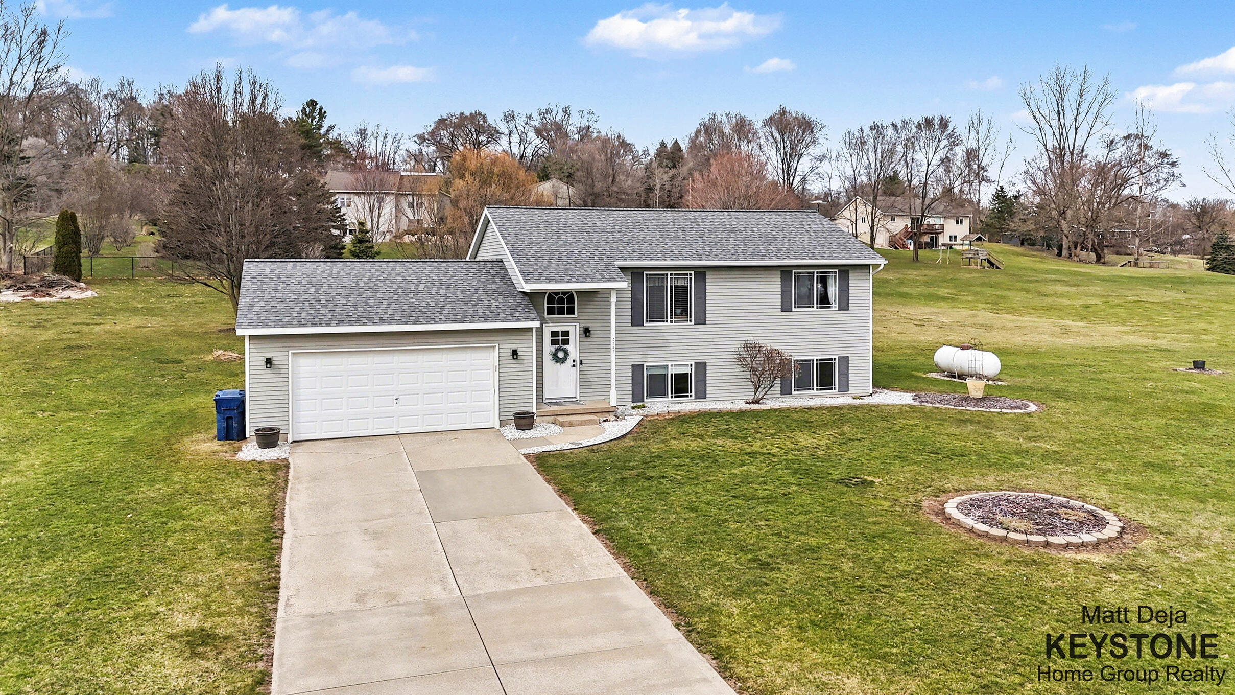 3567 Jacobs Corner Road Northeast Rockford, MI 49341 - Photo 2 of 32 DJI_20260324162828_0084_D
