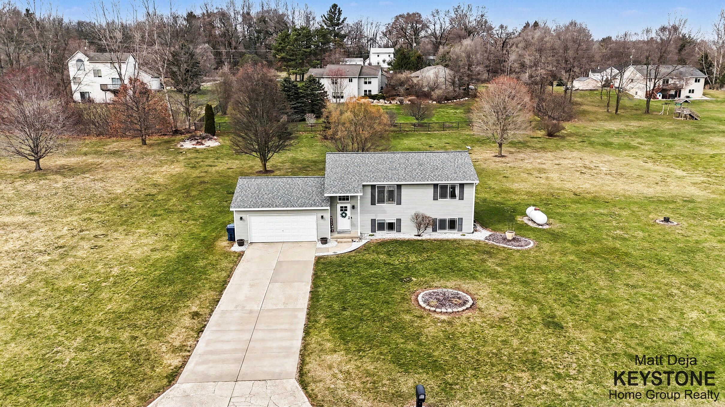 3567 Jacobs Corner Road Northeast Rockford, MI 49341 - Photo 3 of 32 DJI_20260324162847_0085_D
