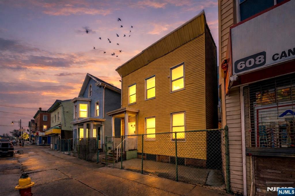 610 Main Street Paterson, NJ 07503 - Photo 1 of 30 a front view of a building with glass windows