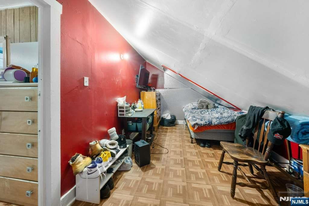 610 Main Street Paterson, NJ 07503 - Photo 17 of 30 a living room with furniture and flowers