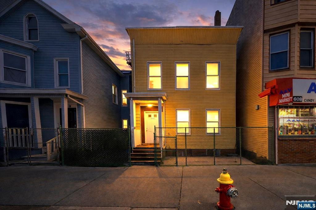 610 Main Street Paterson, NJ 07503 - Photo 2 of 30 a front view of a building with glass windows