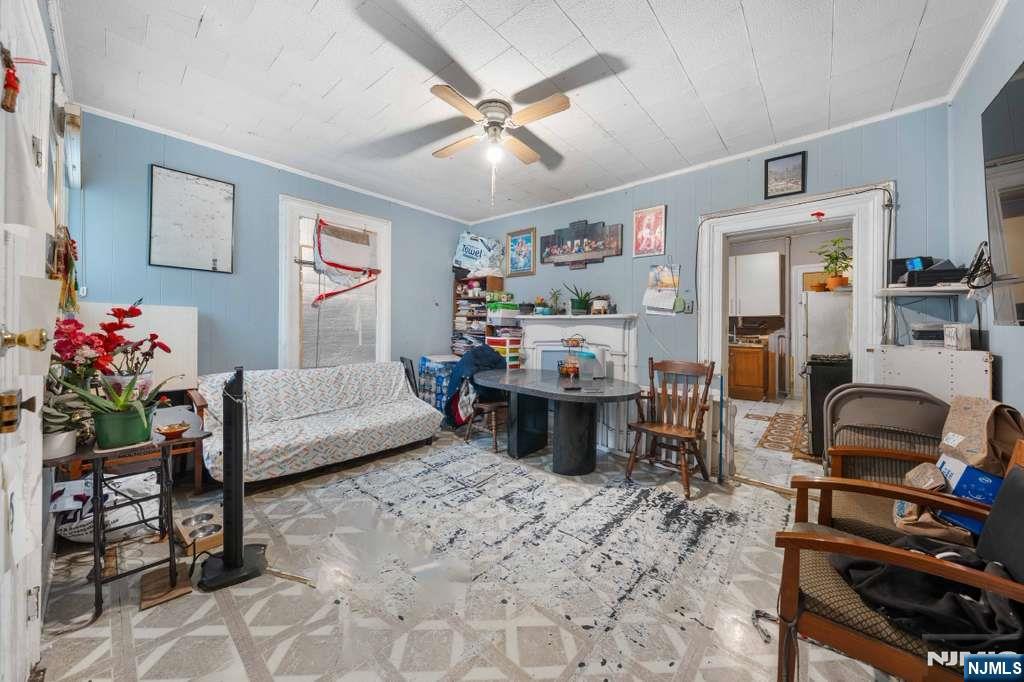 610 Main Street Paterson, NJ 07503 - Photo 4 of 30 a living room with furniture and wooden floor