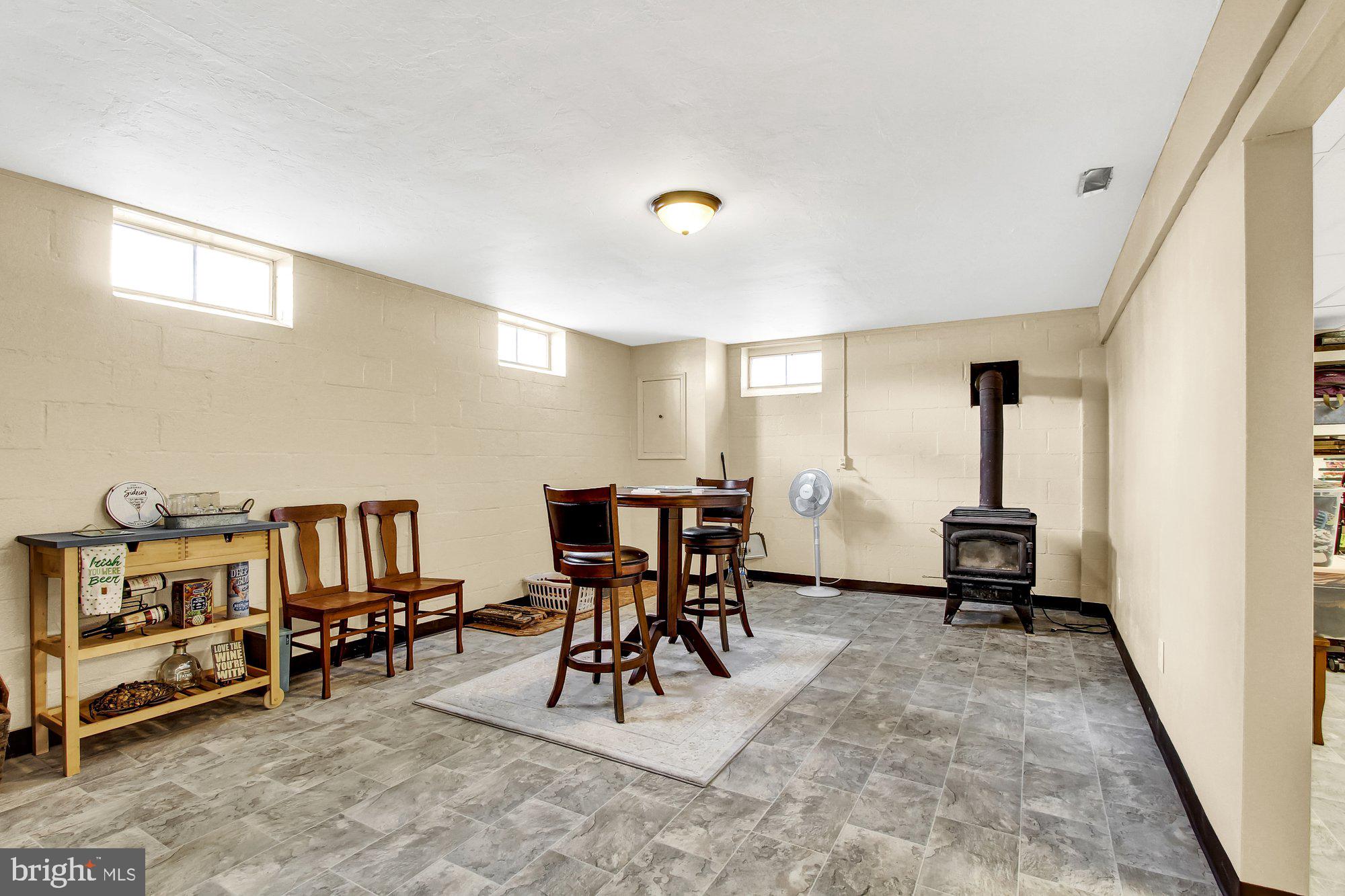 6340 Straw Acres Road Spring Grove, PA 17362 - Photo 8 of 49 Rec room w/wood burning stove