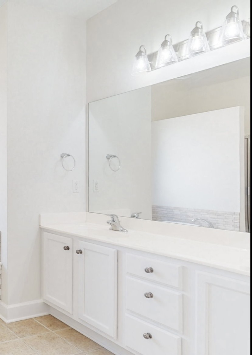 2030 Spring Branch Drive Madison, TN 37115 - Photo 24 of 32 a bathroom with a sink and a mirror