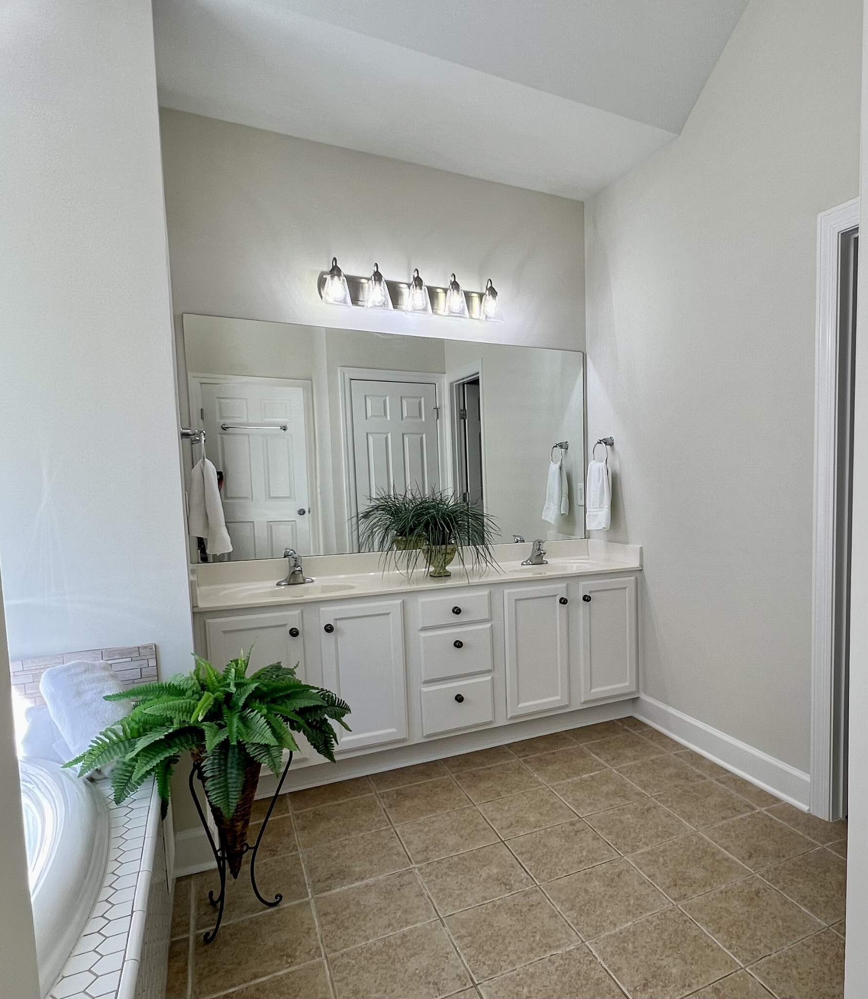 2030 Spring Branch Drive Madison, TN 37115 - Photo 25 of 32 a spacious bathroom with a sink and a mirror