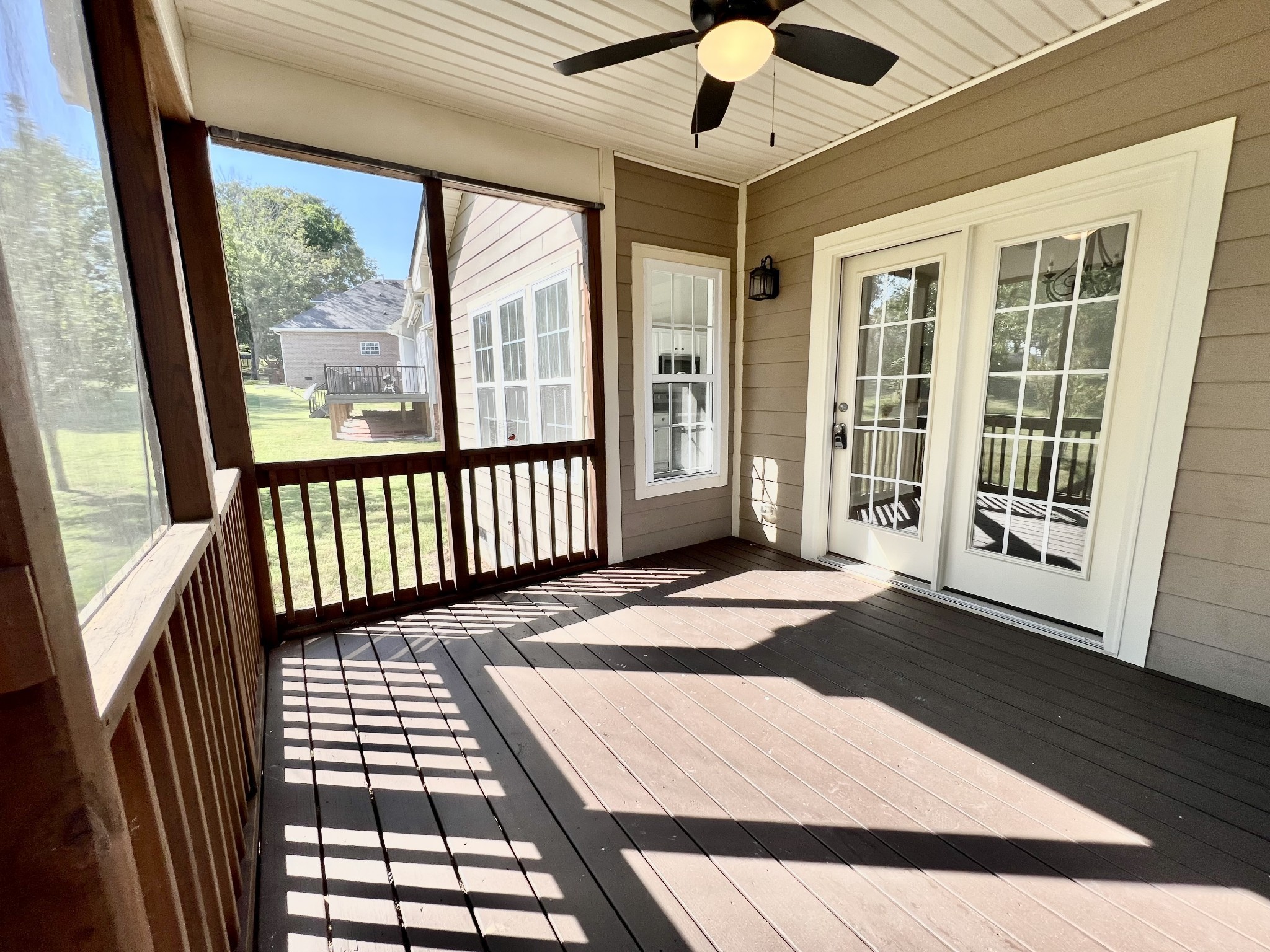 2030 Spring Branch Drive Madison, TN 37115 - Photo 31 of 32 an empty room with wooden floor and windows