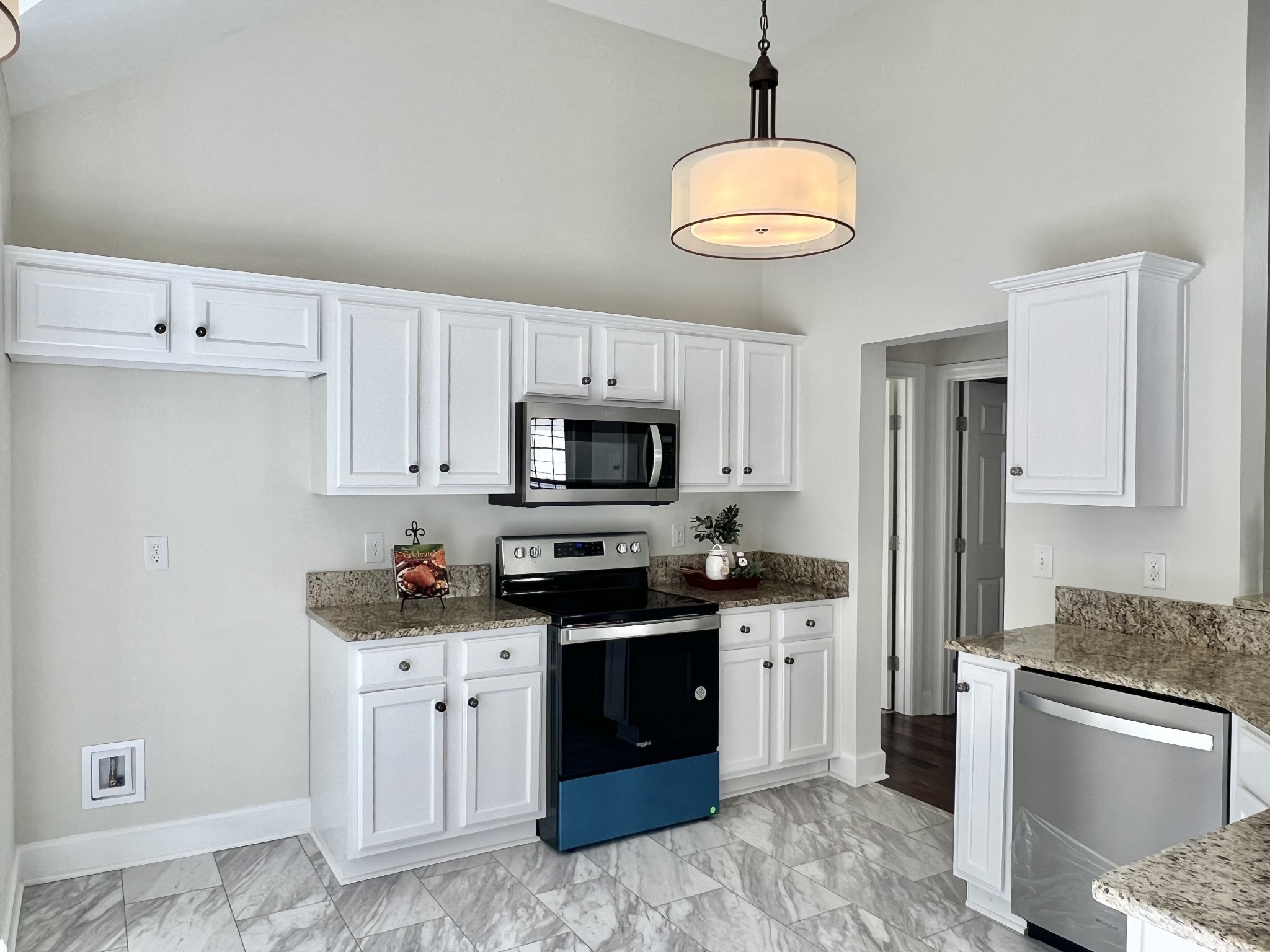 2030 Spring Branch Drive Madison, TN 37115 - Photo 32 of 32 a kitchen with stainless steel appliances granite countertop a sink and cabinets