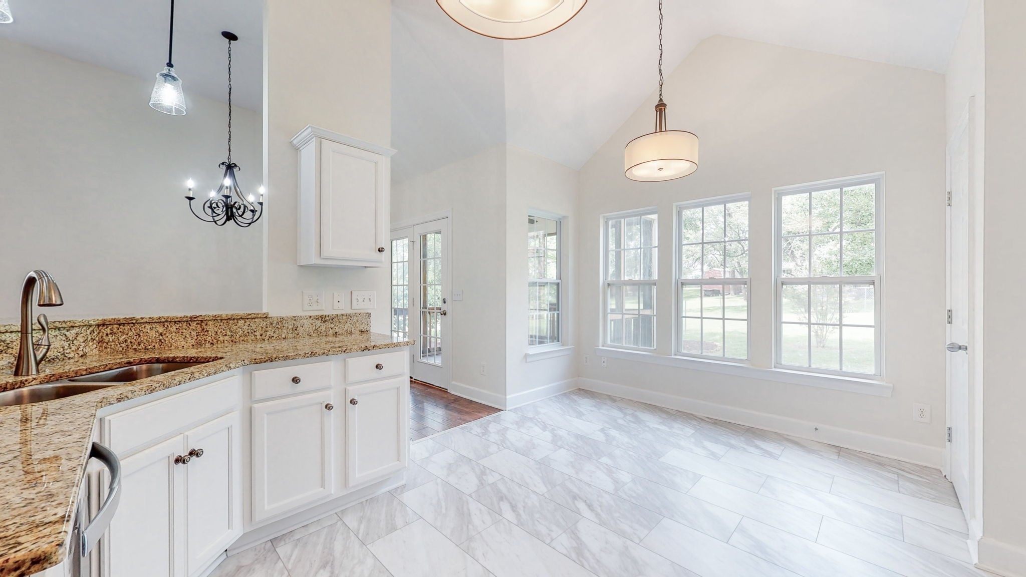 2030 Spring Branch Drive Madison, TN 37115 - Photo 7 of 32 a view of a kitchen with granite countertop cabinets and a large window