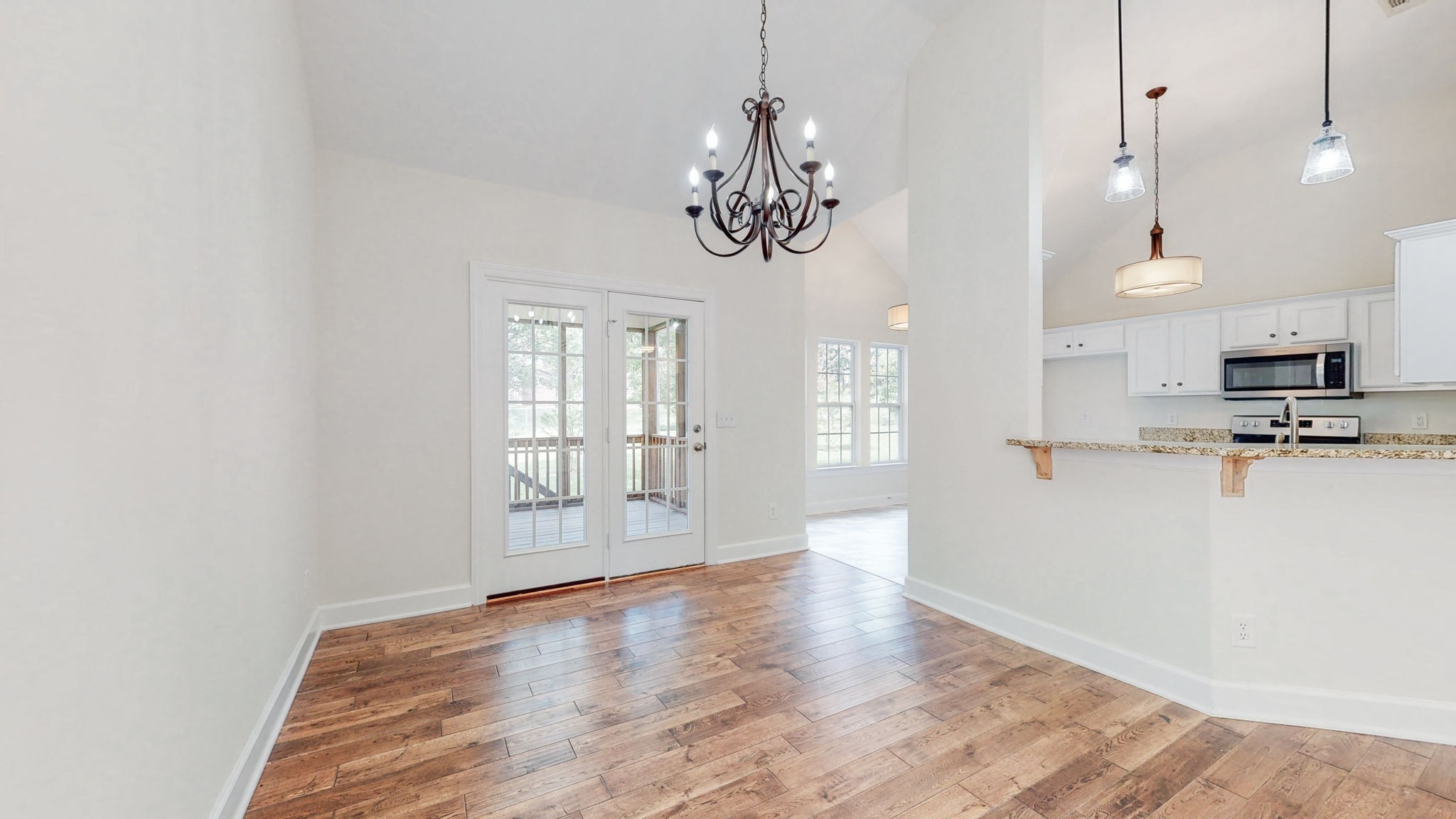 2030 Spring Branch Drive Madison, TN 37115 - Photo 8 of 32 a view of an empty room with window and wooden floor