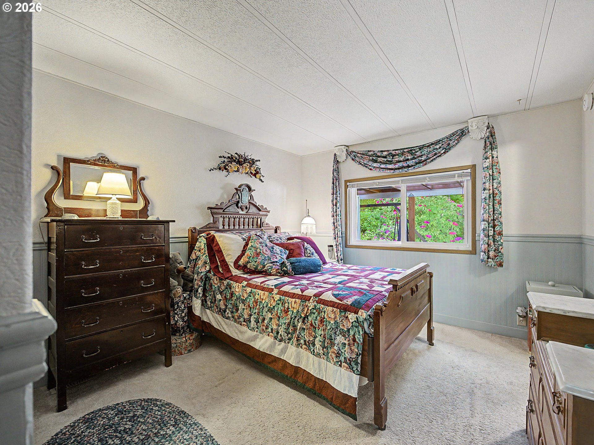 50995 Southeast Baty Road Sandy, OR 97055 - Photo 21 of 47 a bedroom with a bed and a dresser