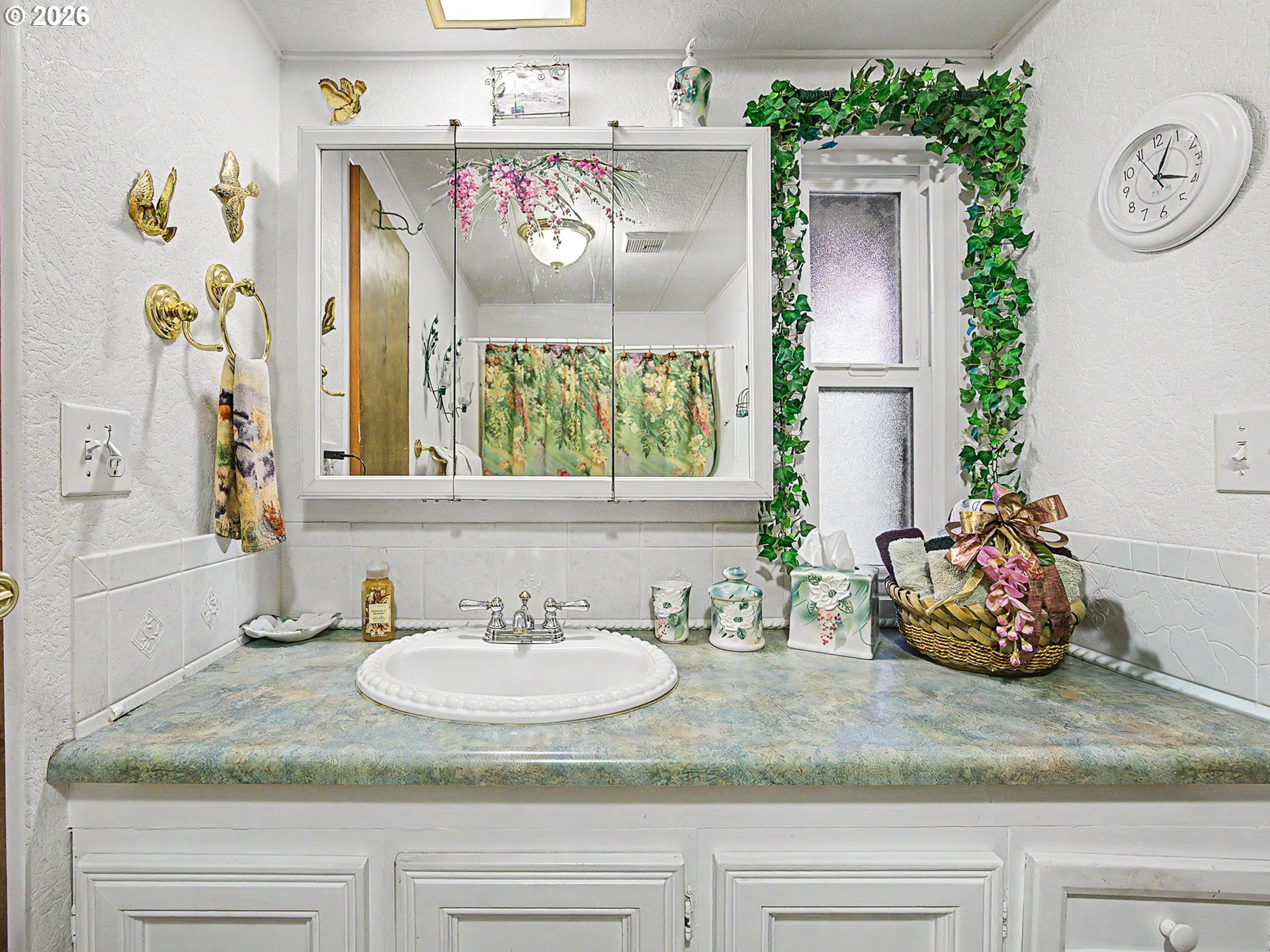 50995 Southeast Baty Road Sandy, OR 97055 - Photo 24 of 47 a bathroom with a sink and a mirror