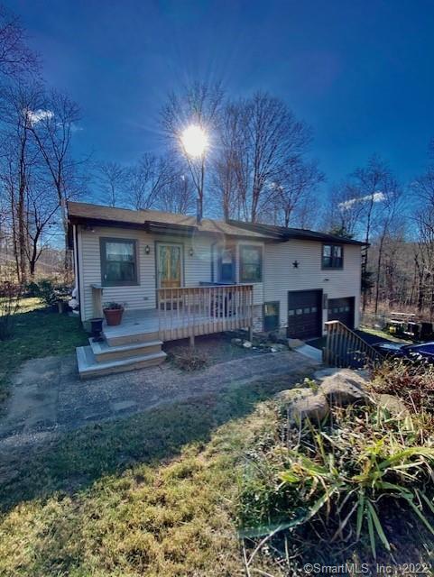377 Turkey Hill Road Haddam, CT 06438 - Photo 1 of 1 a view of a house with backyard and sitting area