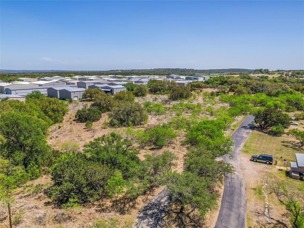 200 Soda Creek Road Spicewood, TX 78669 - Photo 8 of 8 an aerial view of a houses with a yard