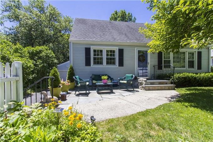 9 Ramapoo Hill Road Ridgefield, CT 06877 - Photo 1 of 1 a view of the house with backyard and sitting area