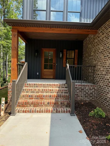 a front view of a house with a garage