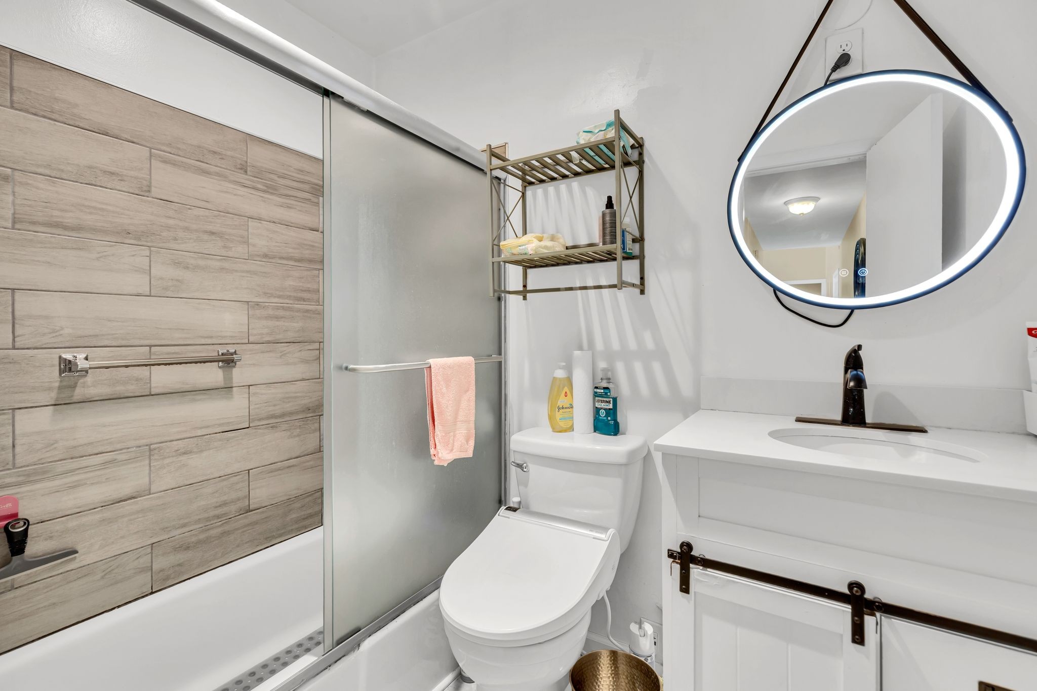 613 Hillsboro Road, Unit D23 Franklin, TN 37064 - Photo 11 of 18 a bathroom with a sink a toilet and a mirror