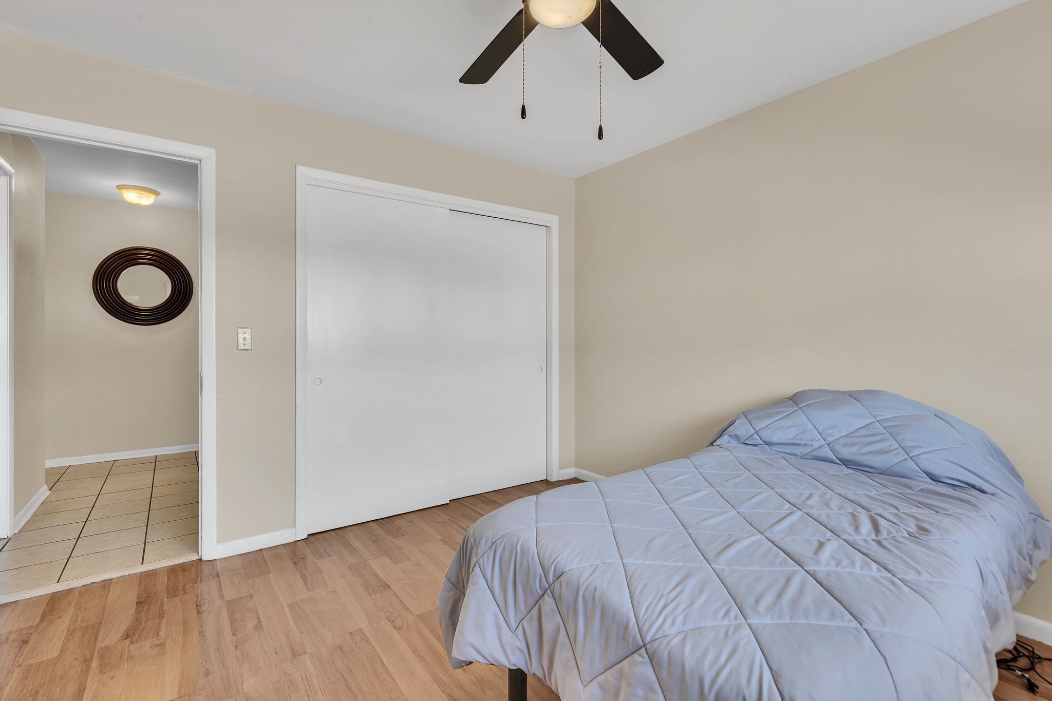 613 Hillsboro Road, Unit D23 Franklin, TN 37064 - Photo 15 of 18 a bedroom with a bed and a walk in closet