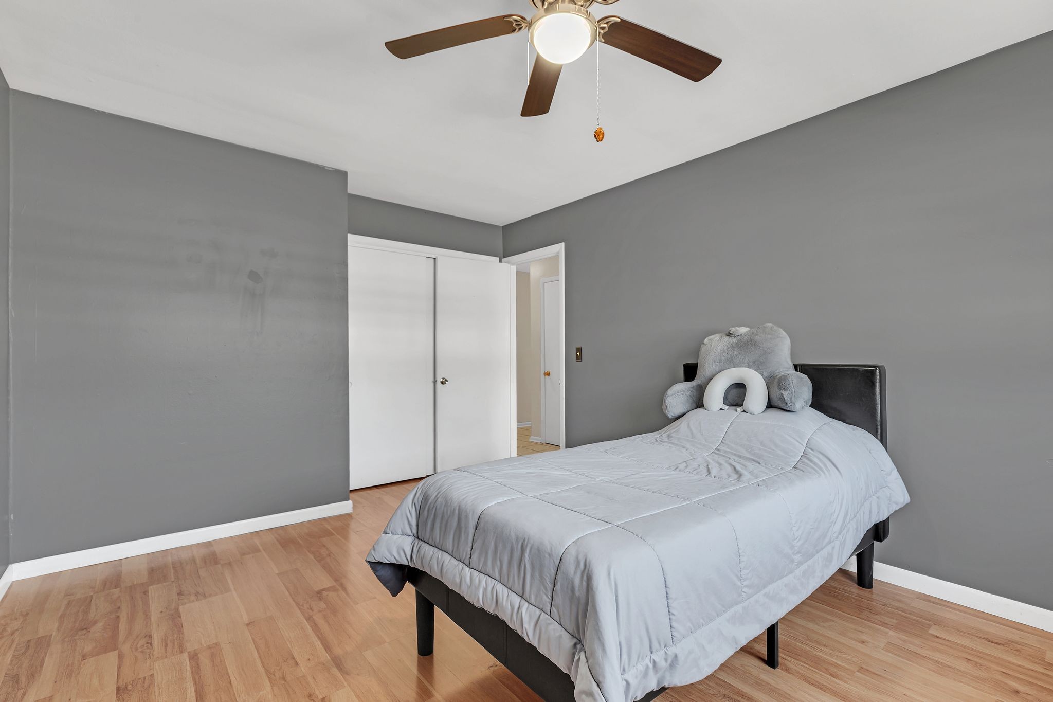 613 Hillsboro Road, Unit D23 Franklin, TN 37064 - Photo 18 of 18 a bedroom with a bed and wooden floor