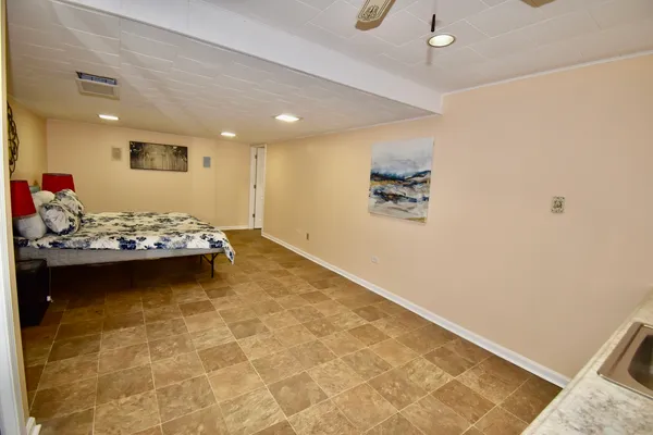a living room with hard wood flooring