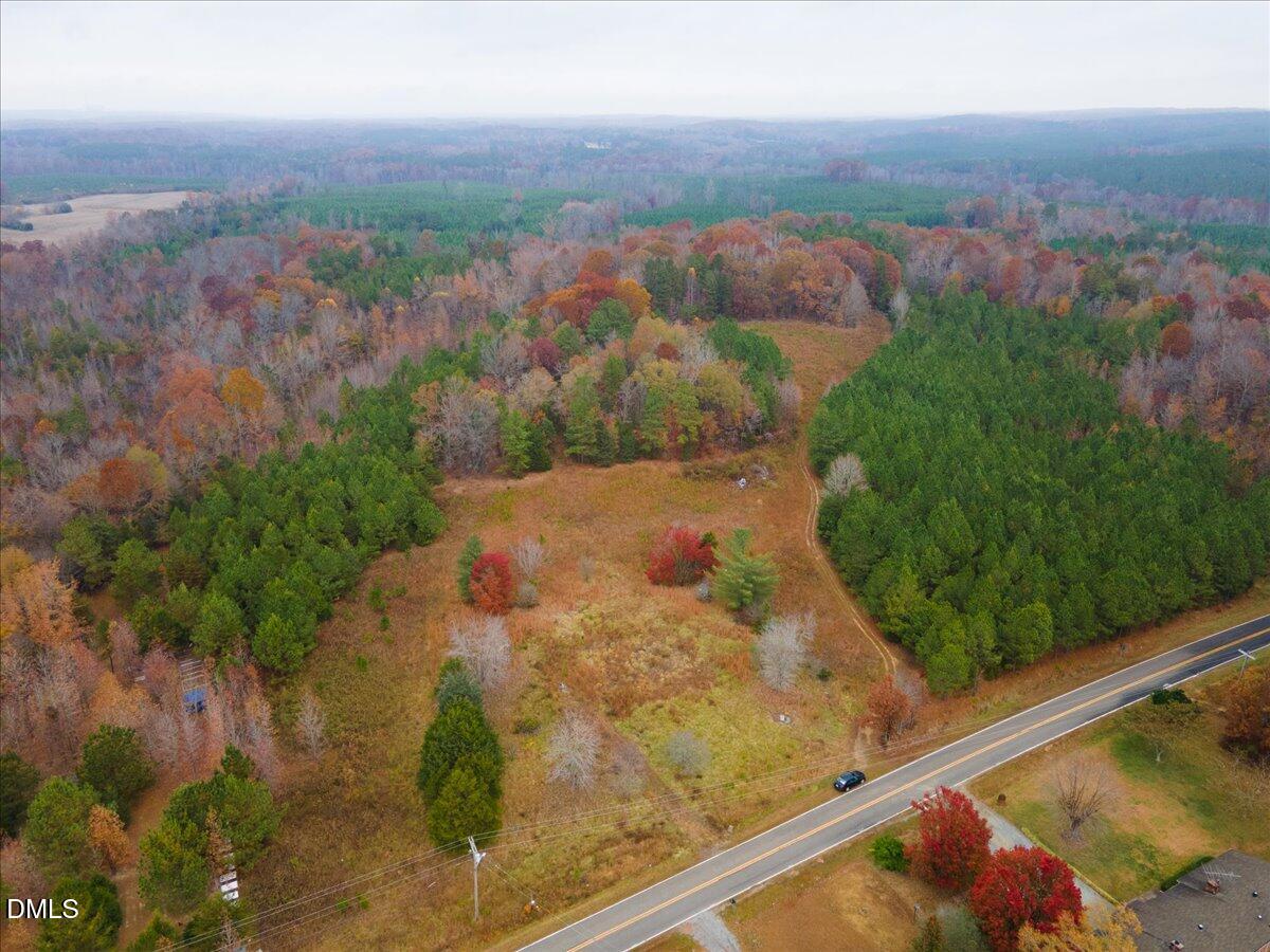 1923 Lawson Chapel Church Road Roxboro, NC 27574 - Photo 3 of 19 an aerial view of mountain with beach