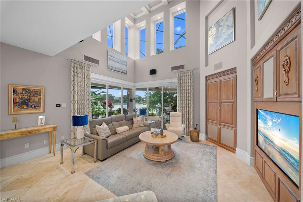 10057 Orchid Ridge Lane Estero, FL 34135 - Photo 12 of 30 a living room with furniture and a large window