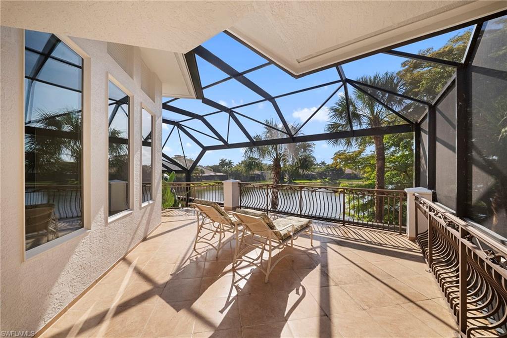 10057 Orchid Ridge Lane Estero, FL 34135 - Photo 28 of 30 a view of a balcony with couch and wooden floor