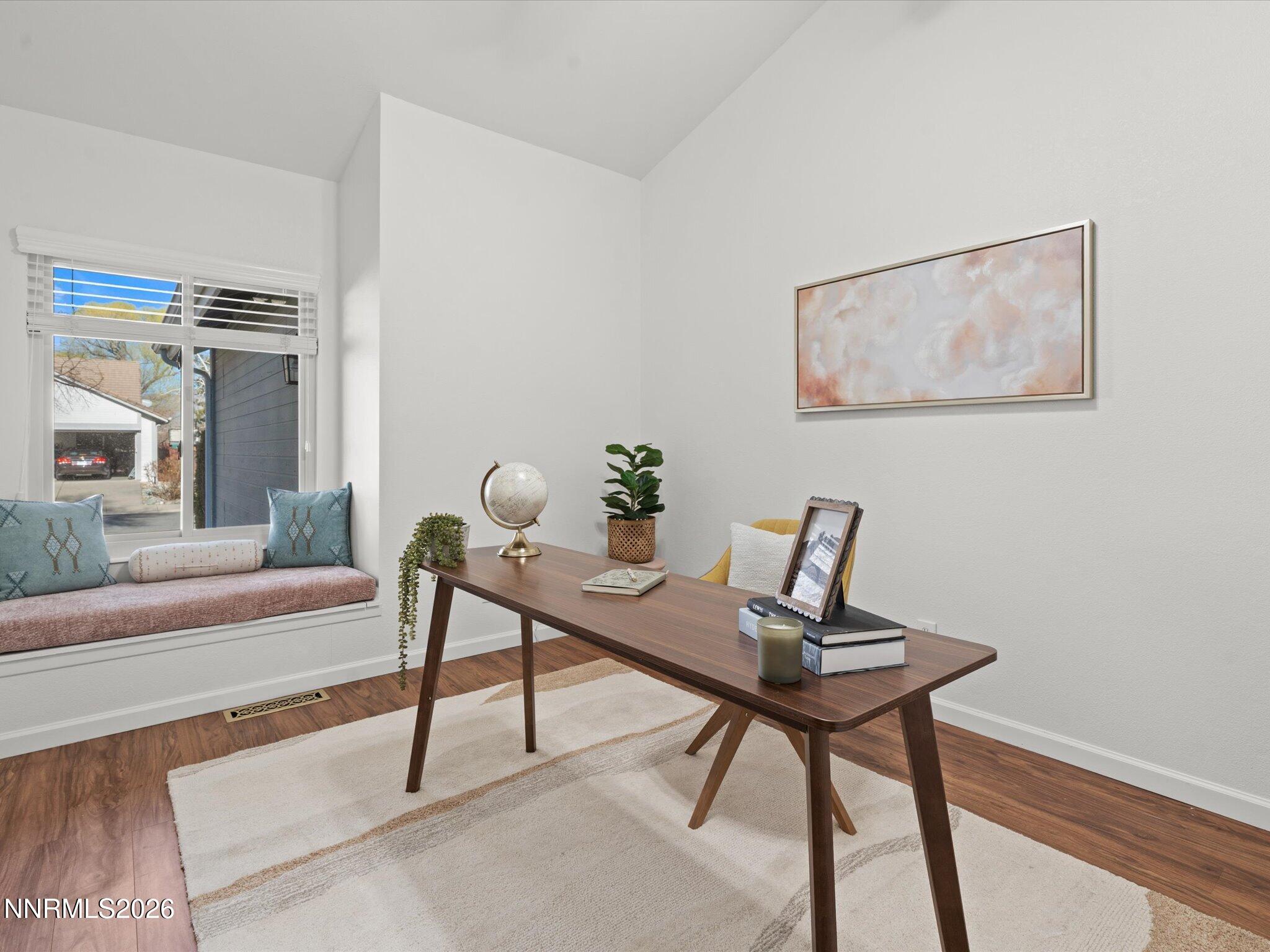 1588 Wheatgrass Drive Reno, NV 89509 - Photo 11 of 42 a workspace with furniture and a potted plant