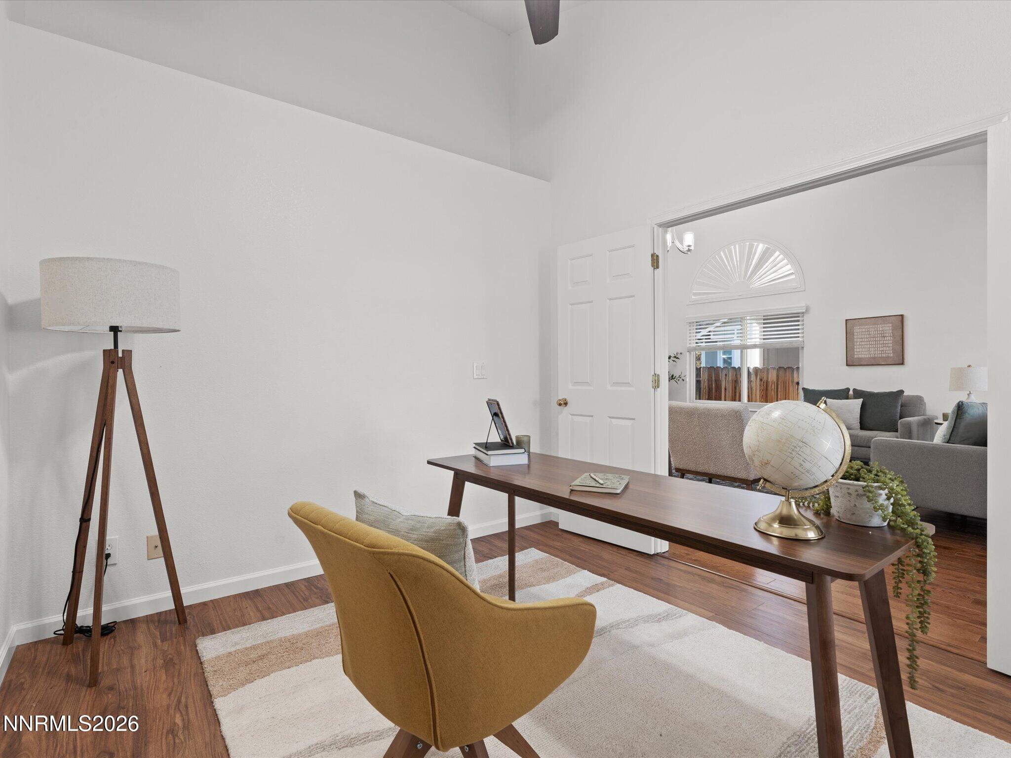 1588 Wheatgrass Drive Reno, NV 89509 - Photo 12 of 42 a living room with furniture and a wooden floor