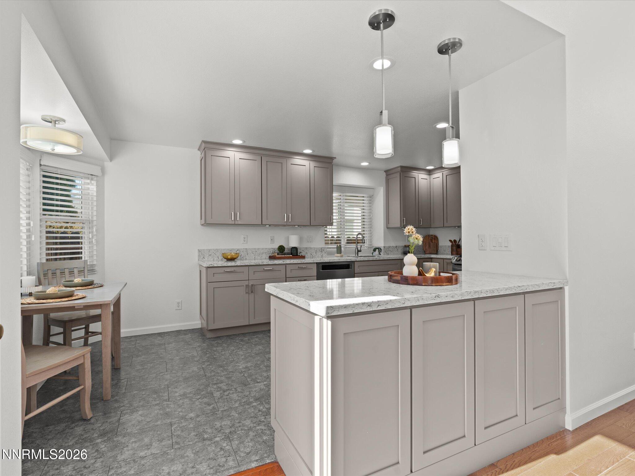 1588 Wheatgrass Drive Reno, NV 89509 - Photo 16 of 42 a kitchen with a sink cabinets and window
