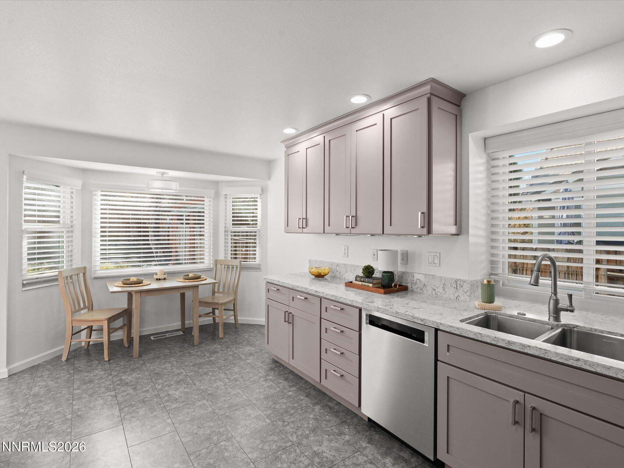 1588 Wheatgrass Drive Reno, NV 89509 - Photo 22 of 42 a kitchen with a sink and cabinets